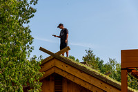 Sodding the Roof at Stabbur by Len Villano